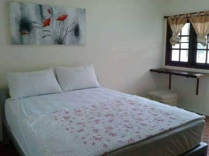 Js Guesthouse Тау Экстерьер фото